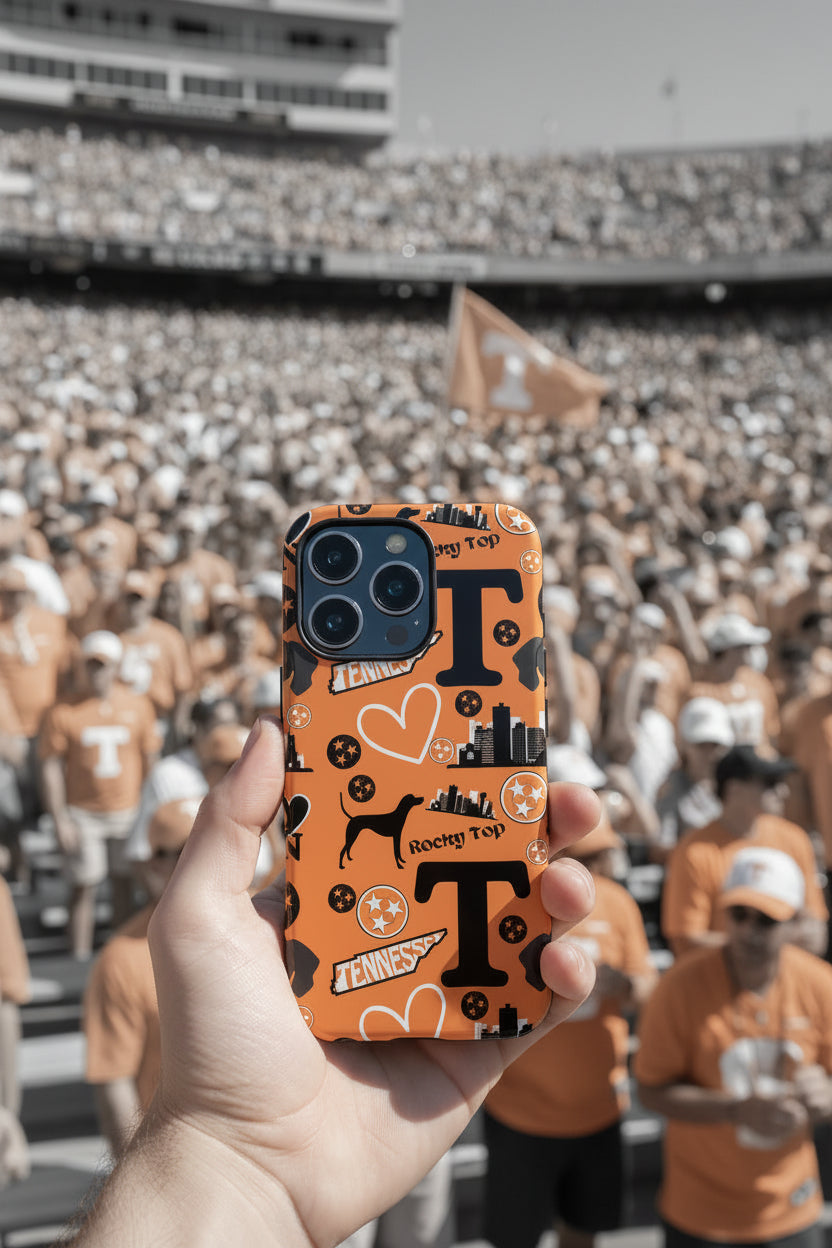 Phone case with Tennessee-themed design on an orange background