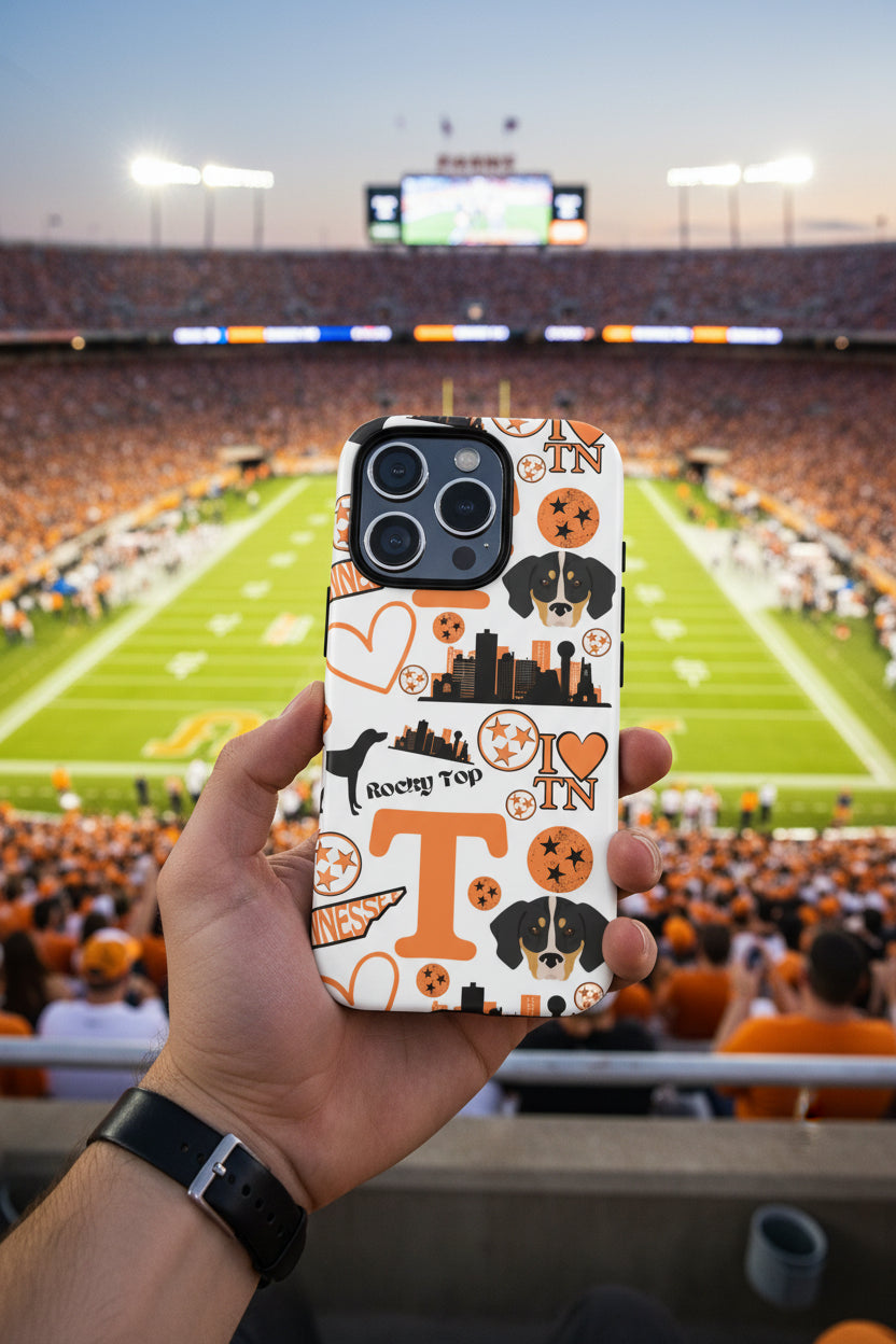 Phone case with Tennessee-themed design featuring dogs, 'I ❤️ TN', and 'T' letter.